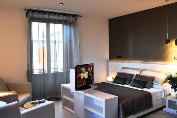 Egyptian cotton sheets, down comforters, memory foam beds, minibar