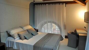 Egyptian cotton sheets, down duvets, memory-foam beds, minibar