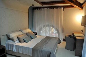 Egyptian cotton sheets, down duvets, memory-foam beds, minibar