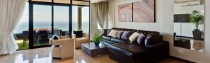 Luxury Suite, Sea View (Tanzanite) | Living area | Flat-screen TV - Atlantic Gold (Cape Town)