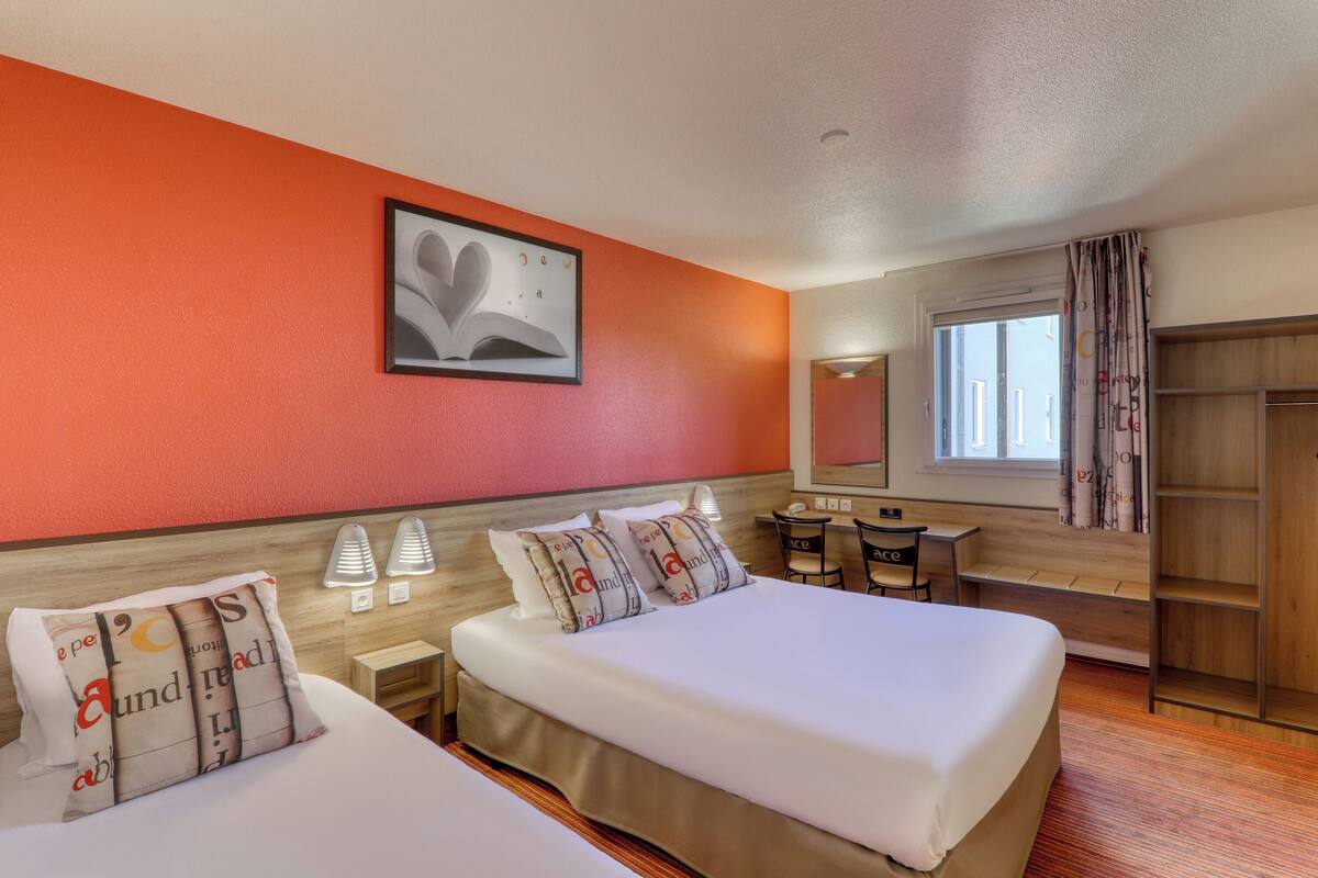 Triple Room | Desk, blackout drapes, soundproofing, iron/ironing board (on request)