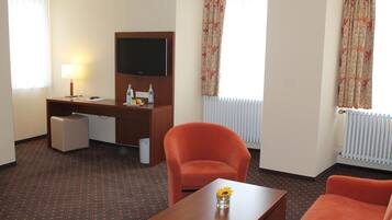 Hypo-allergenic bedding, down comforters, pillowtop beds, in-room safe