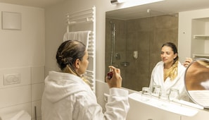 Shower, free toiletries, hair dryer, towels