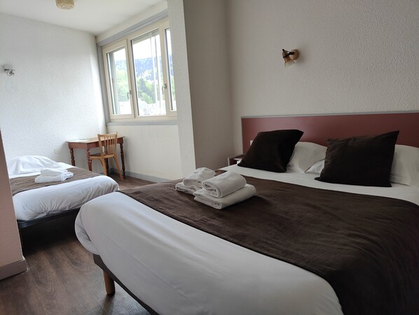 Comfort Triple Room | Premium bedding, desk, soundproofing, iron/ironing board