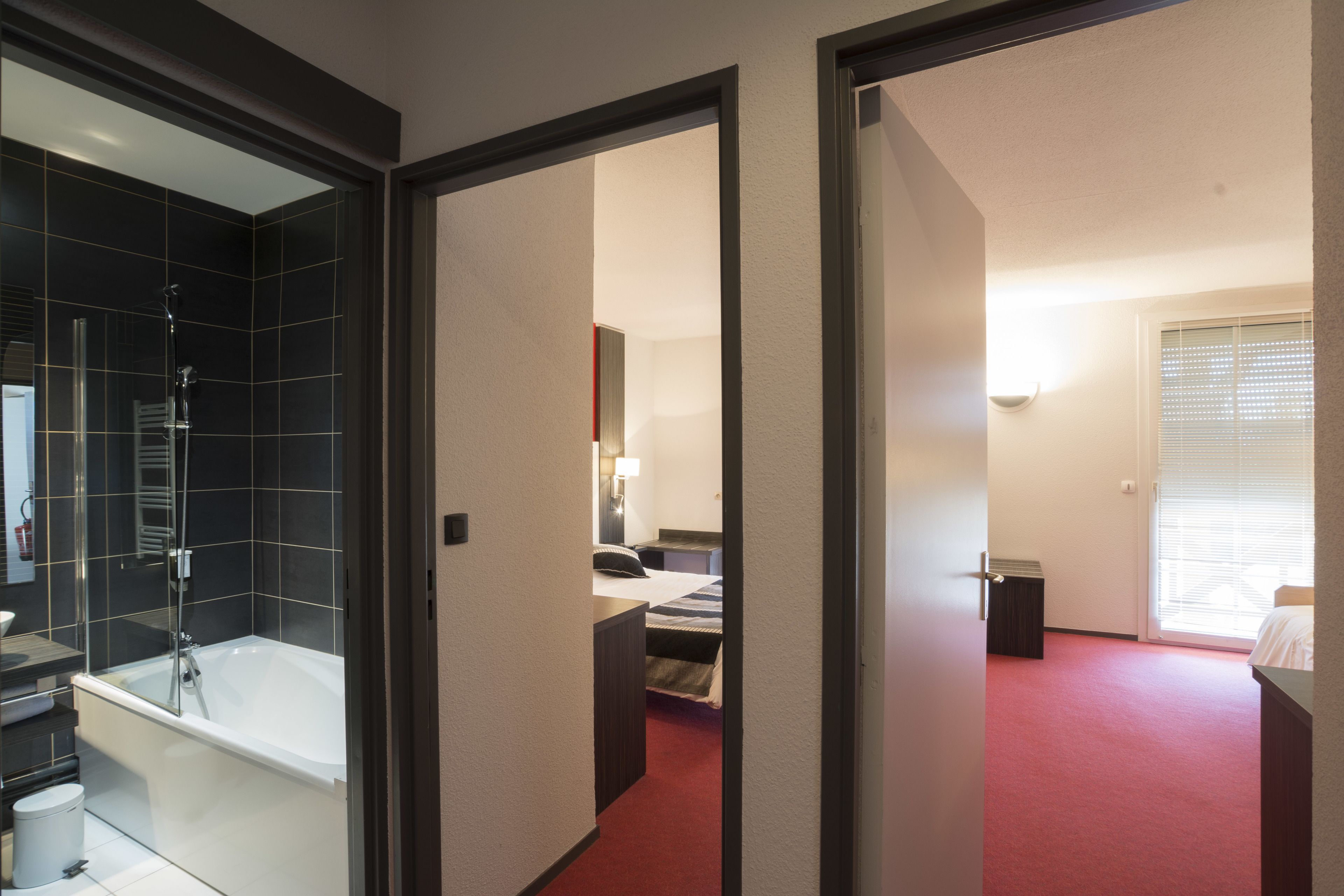 suite | in-room safe, desk, blackout curtains, iron/ironing board