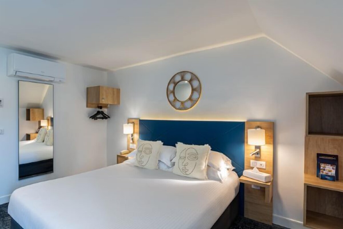 Premium bedding, desk, laptop workspace, iron/ironing board (on request)