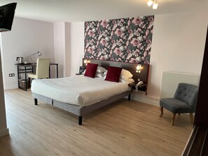 Premium bedding, individually decorated, desk, laptop workspace