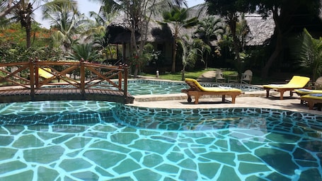 Outdoor pool, pool umbrellas, sun loungers