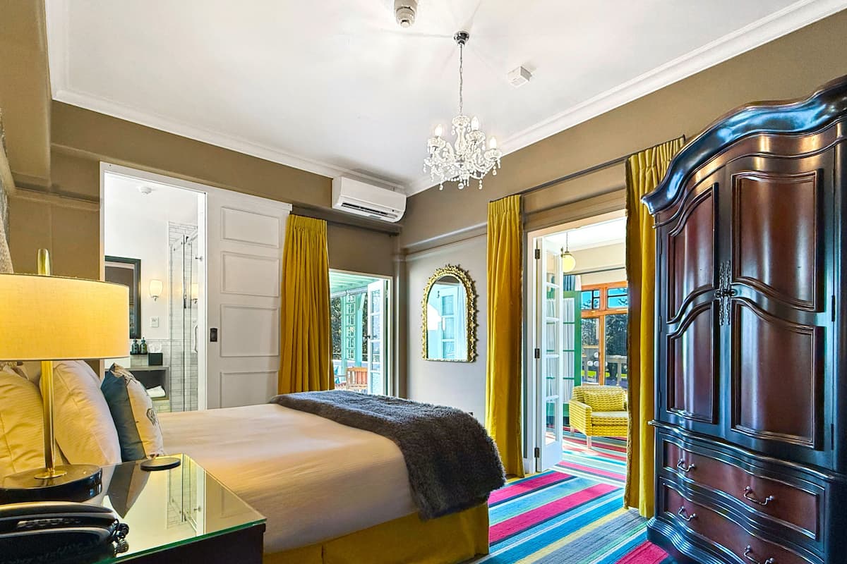 pacific view suite | in-room safe, desk, blackout curtains, iron/ironing board