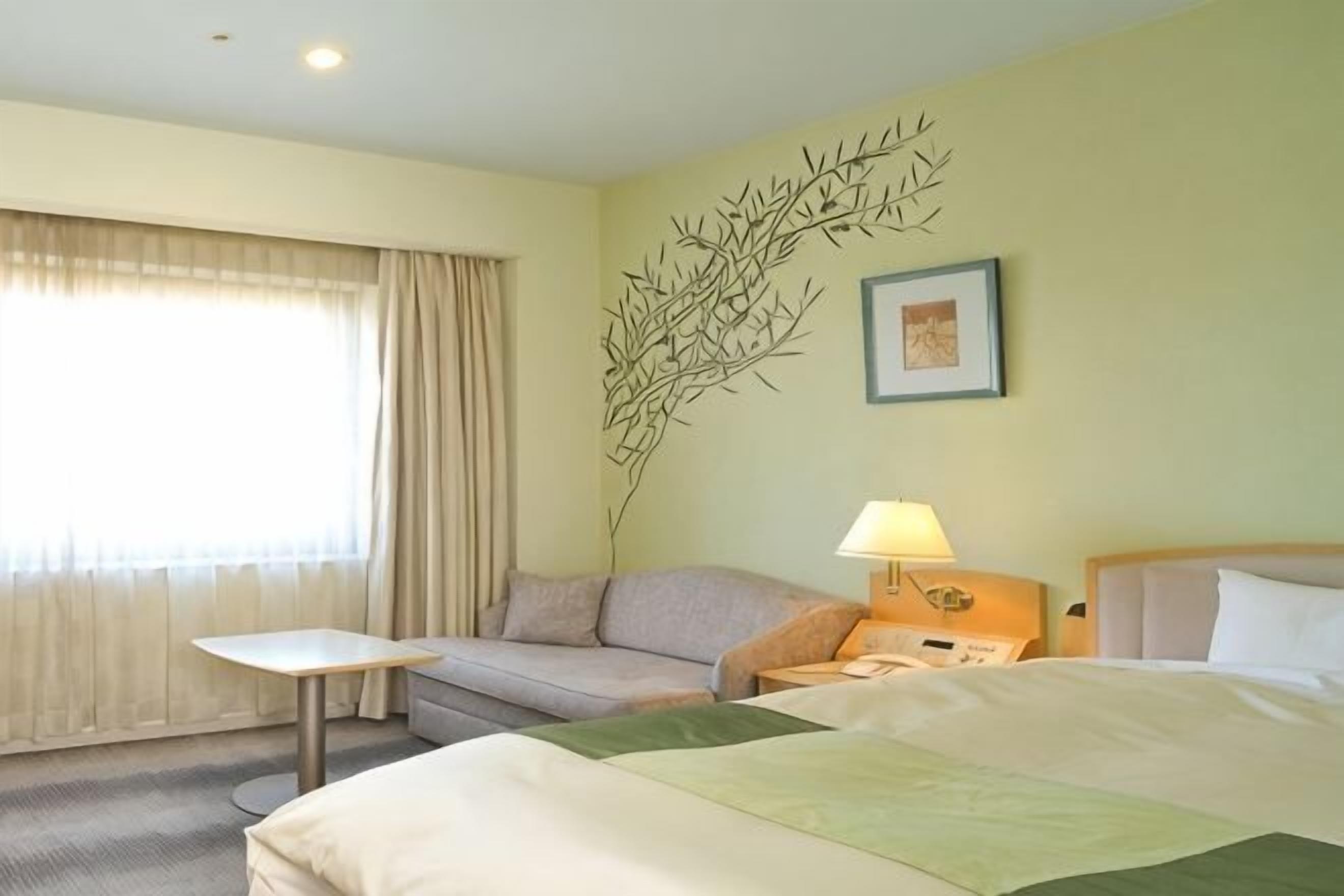 Down comforters, desk, blackout drapes, soundproofing