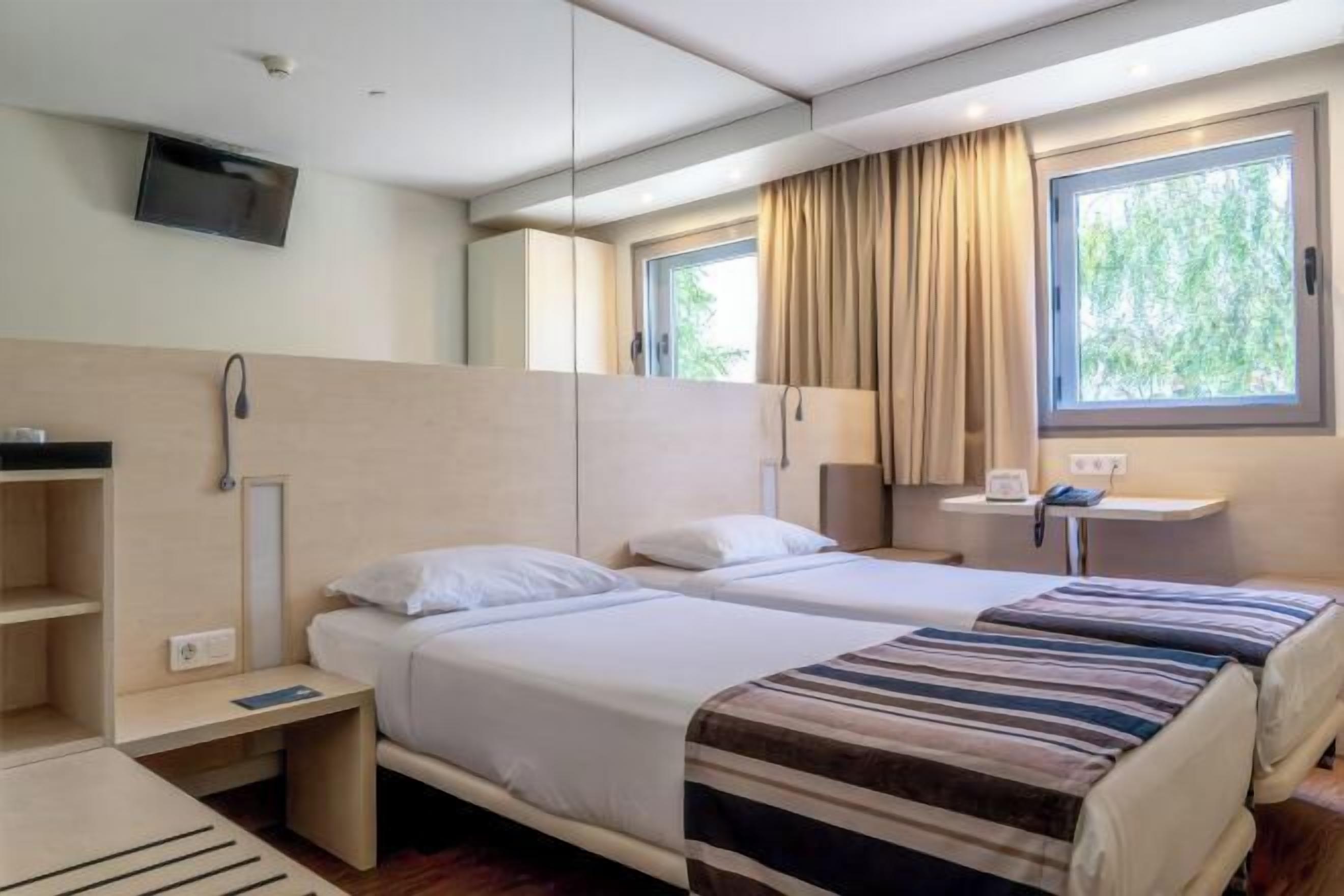 In-room safe, desk, blackout curtains, soundproofing