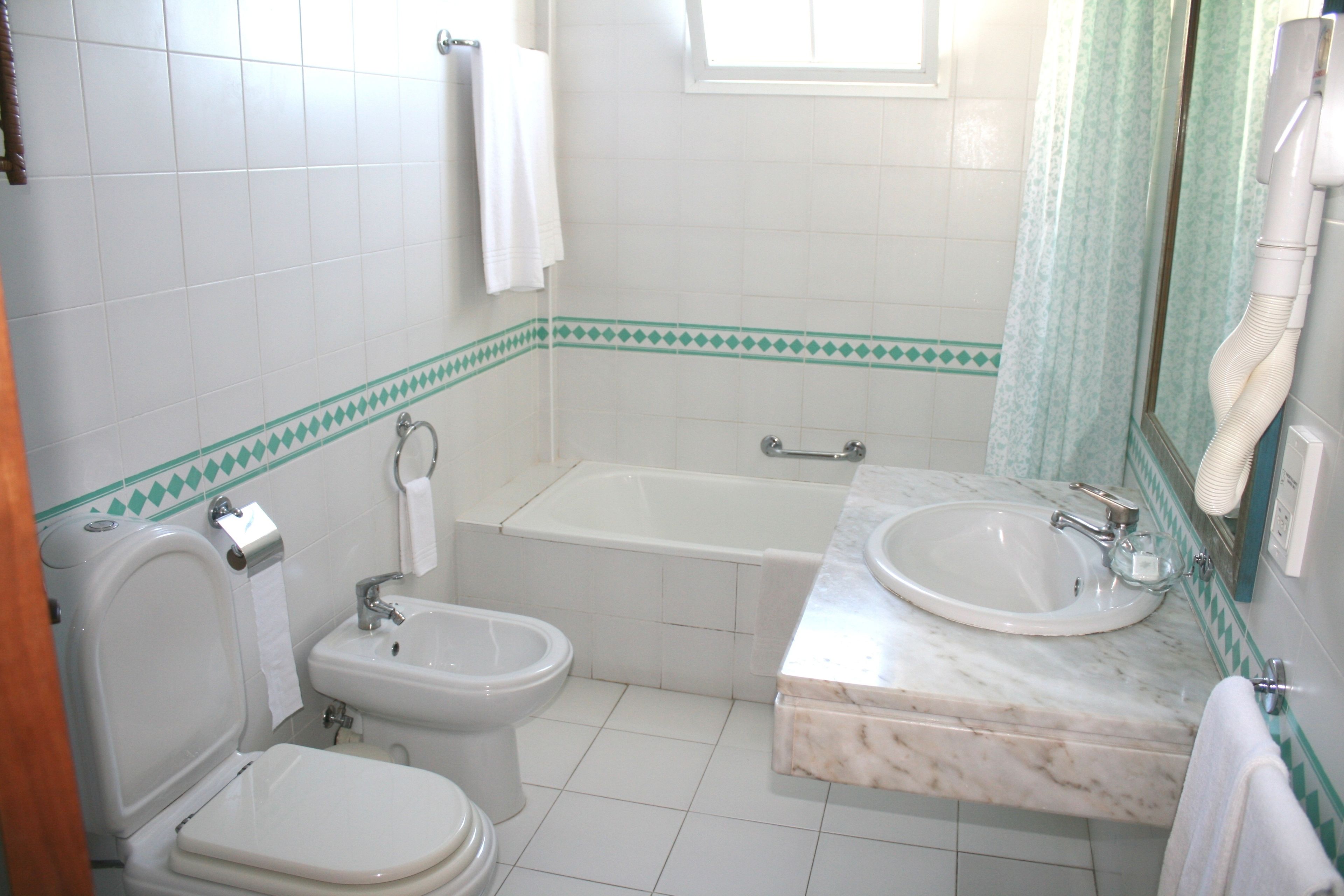 apartment, 1 bedroom | bathroom | separate bathtub and shower, hair dryer, towels