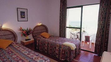 Apartment, 1 Bedroom | Minibar, iron/ironing board, free WiFi, bed sheets