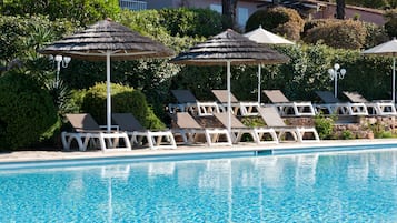 Seasonal outdoor pool, pool umbrellas, pool loungers