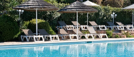 Seasonal outdoor pool, pool umbrellas, pool loungers