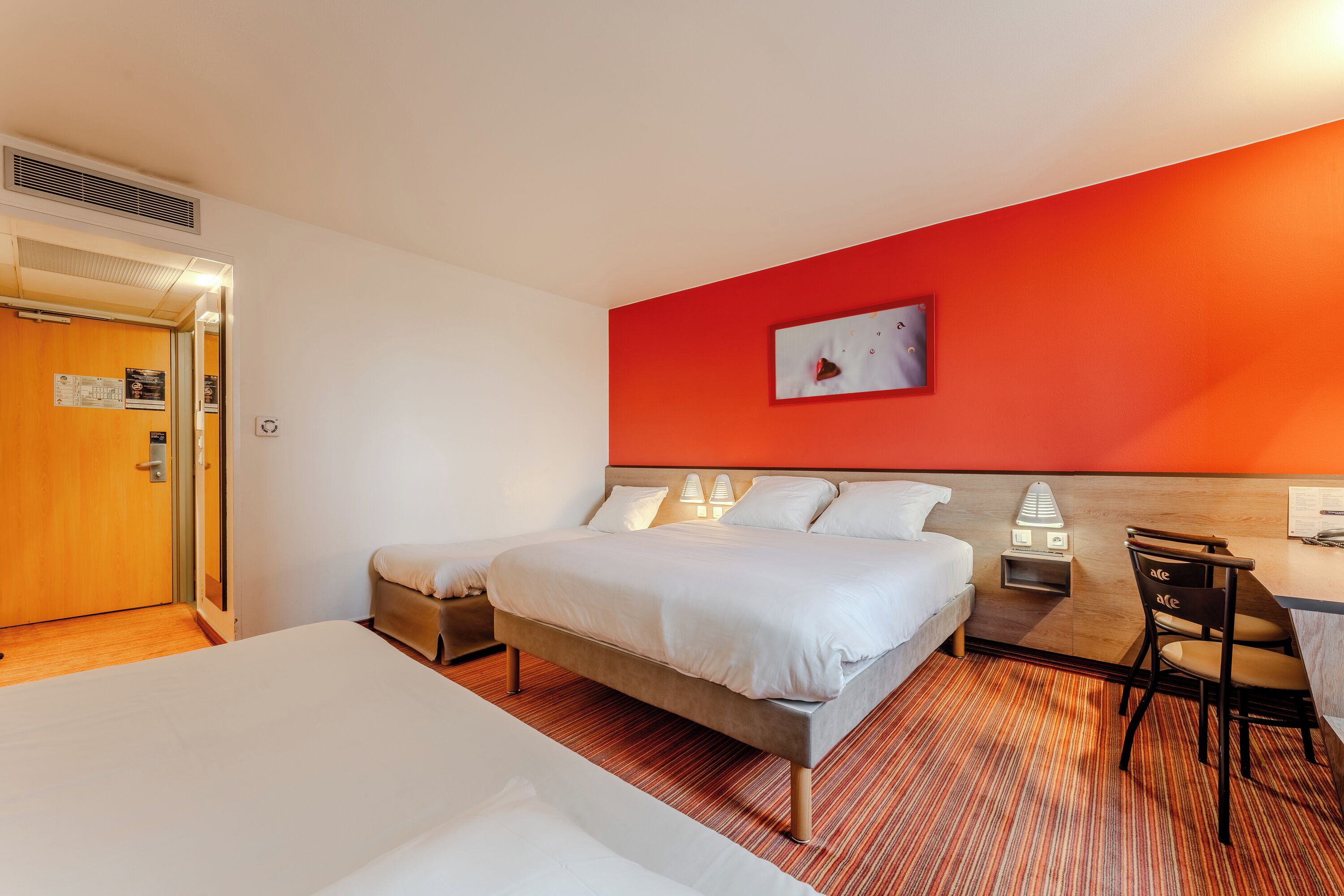 family room | premium bedding, individually furnished, desk, blackout curtains