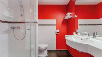 Douche, articles de toilette gratuits, sĂšche-cheveux