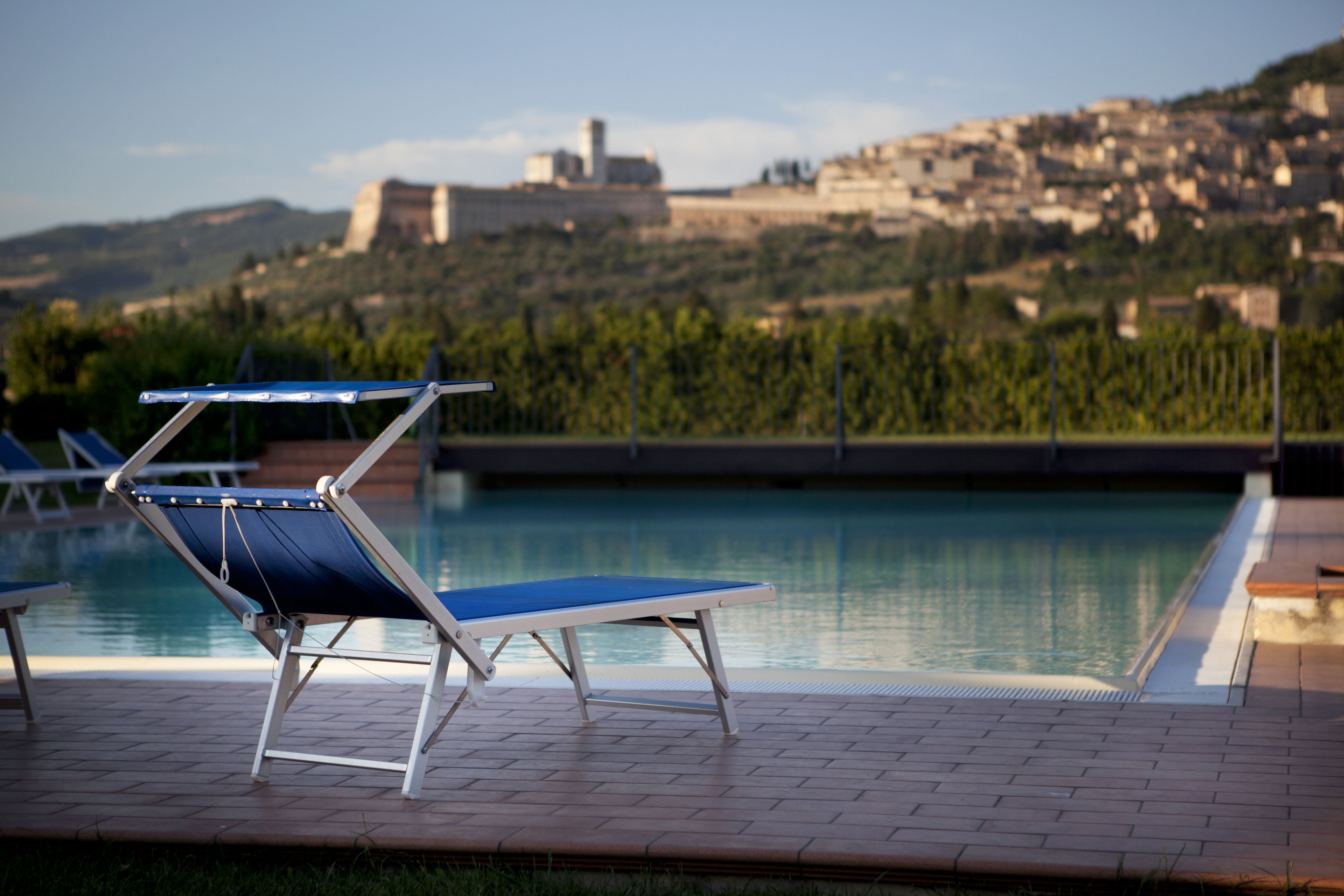 outdoor pool, pool umbrellas, pool loungers