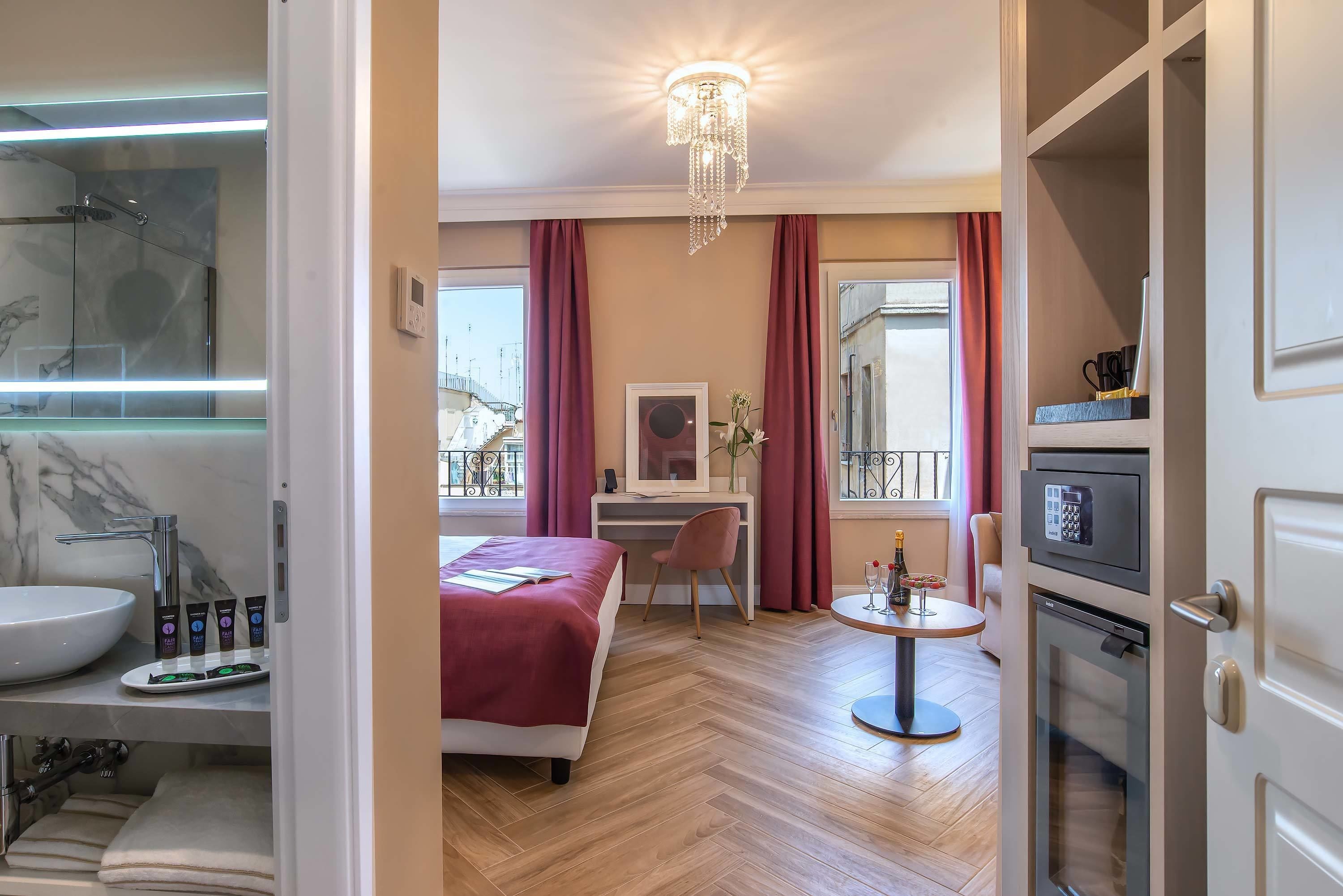 deluxe room, multiple beds | premium bedding, down duvets, pillow-top beds, minibar