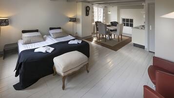 Luxury Room | Down comforters, blackout drapes, iron/ironing board, free WiFi