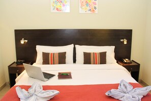 Pillowtop beds, minibar, in-room safe, individually decorated