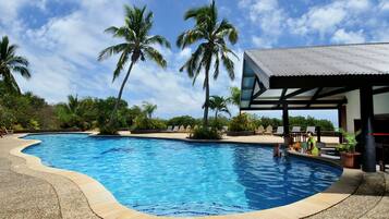 Outdoor pool, open 6:30 AM to 9:00 PM, free pool cabanas, pool umbrellas