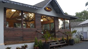 A wooden building with a sign that reads "19th Century." - 19Belo Cabana (Calangute)