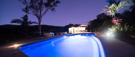 Outdoor pool, pool umbrellas, sun loungers