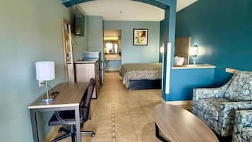 Room, 1 King Bed, Non Smoking, Jetted Tub | In-room safe, desk, iron/ironing board, free rollaway beds