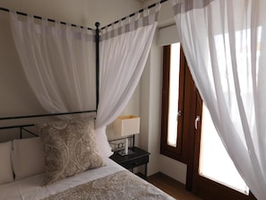 Junior Double Room | Minibar, desk, blackout drapes, free WiFi