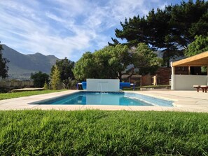 2 outdoor pools, pool umbrellas, pool loungers
