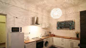 Apartment, 6 Bedrooms | Private kitchen | Full-sized fridge, microwave, oven, stovetop