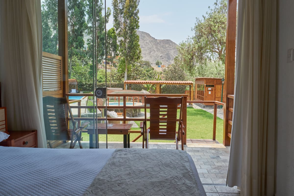 Triple Room, Pool View | Minibar, desk, free WiFi, bed sheets