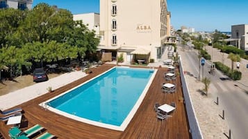 Seasonal outdoor pool, pool umbrellas, sun loungers