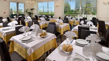 Breakfast, lunch, dinner served; Italian cuisine, pool views