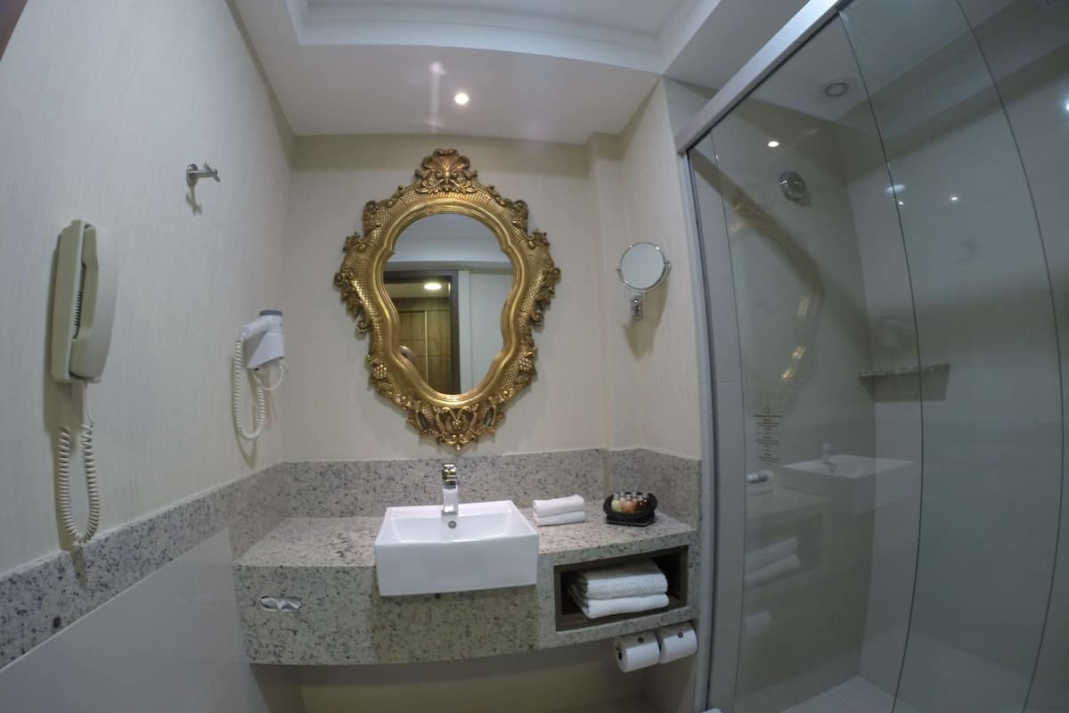 shower, hair dryer, bathrobes, towels