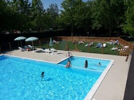 Seasonal outdoor pool, pool umbrellas, sun loungers