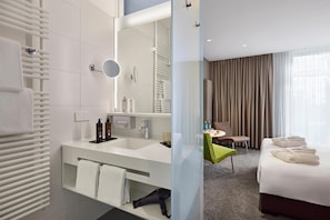 Shower, hair dryer, bathrobes, towels