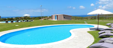 2 outdoor pools, pool umbrellas, sun loungers