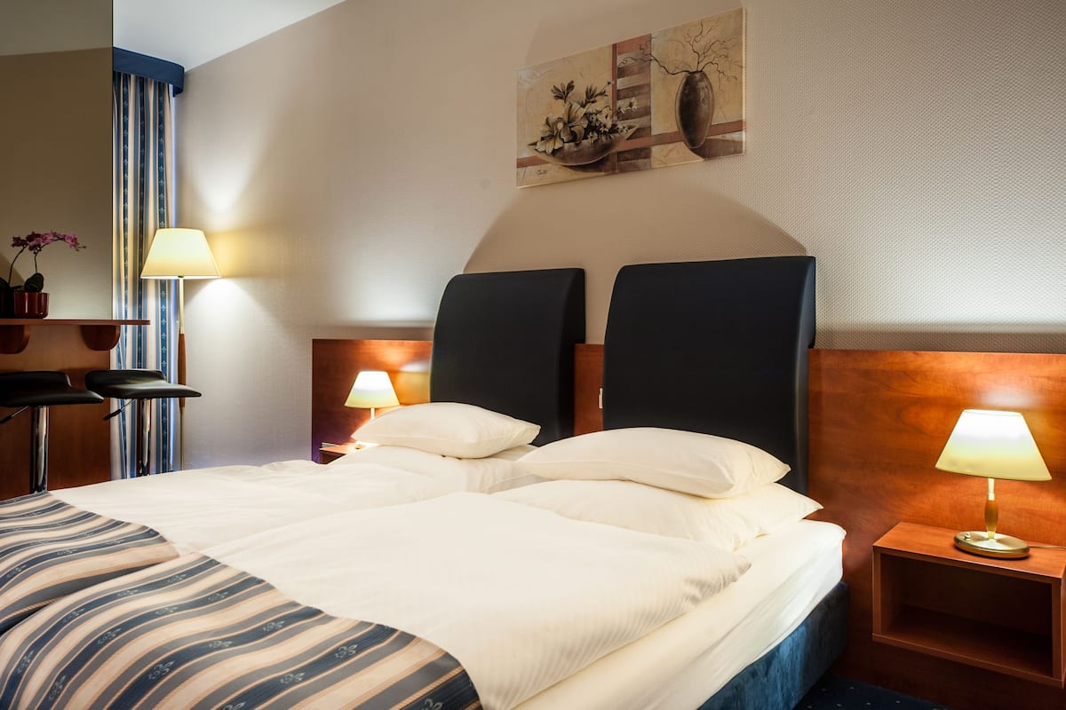 junior suite | premium bedding, in-room safe, individually decorated