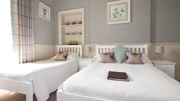 Quadruple Room, Multiple Beds, Ensuite | In-room safe, iron/ironing board, free WiFi, bed sheets