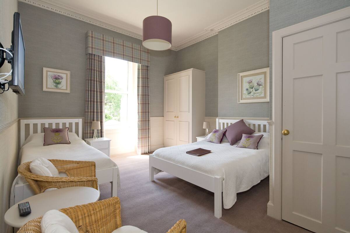 Triple Room, Multiple Beds, Ensuite | In-room safe, iron/ironing board, WiFi (free), bed sheets