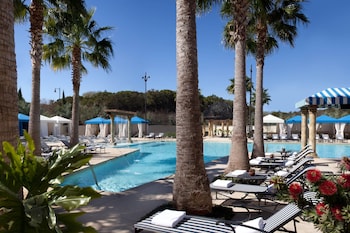 Indoor pool, 2 outdoor pools, cabanas (surcharge), sun loungers at Bluegreen Vacations Eilan Hotel and Spa, an Ascend Collection Resort