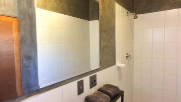 Shower, towels, soap, toilet paper
