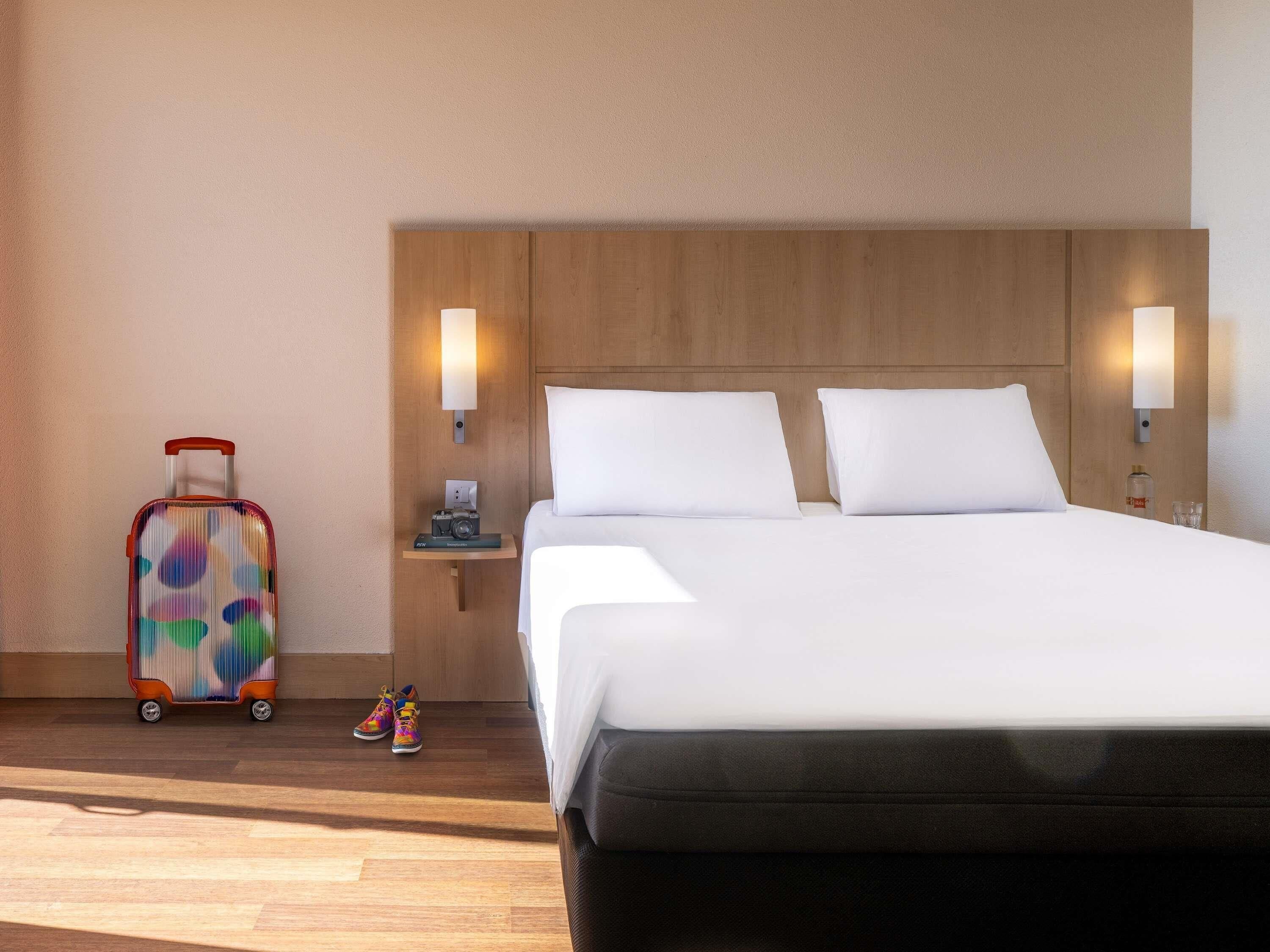 Premium bedding, down duvets, desk, laptop workspace