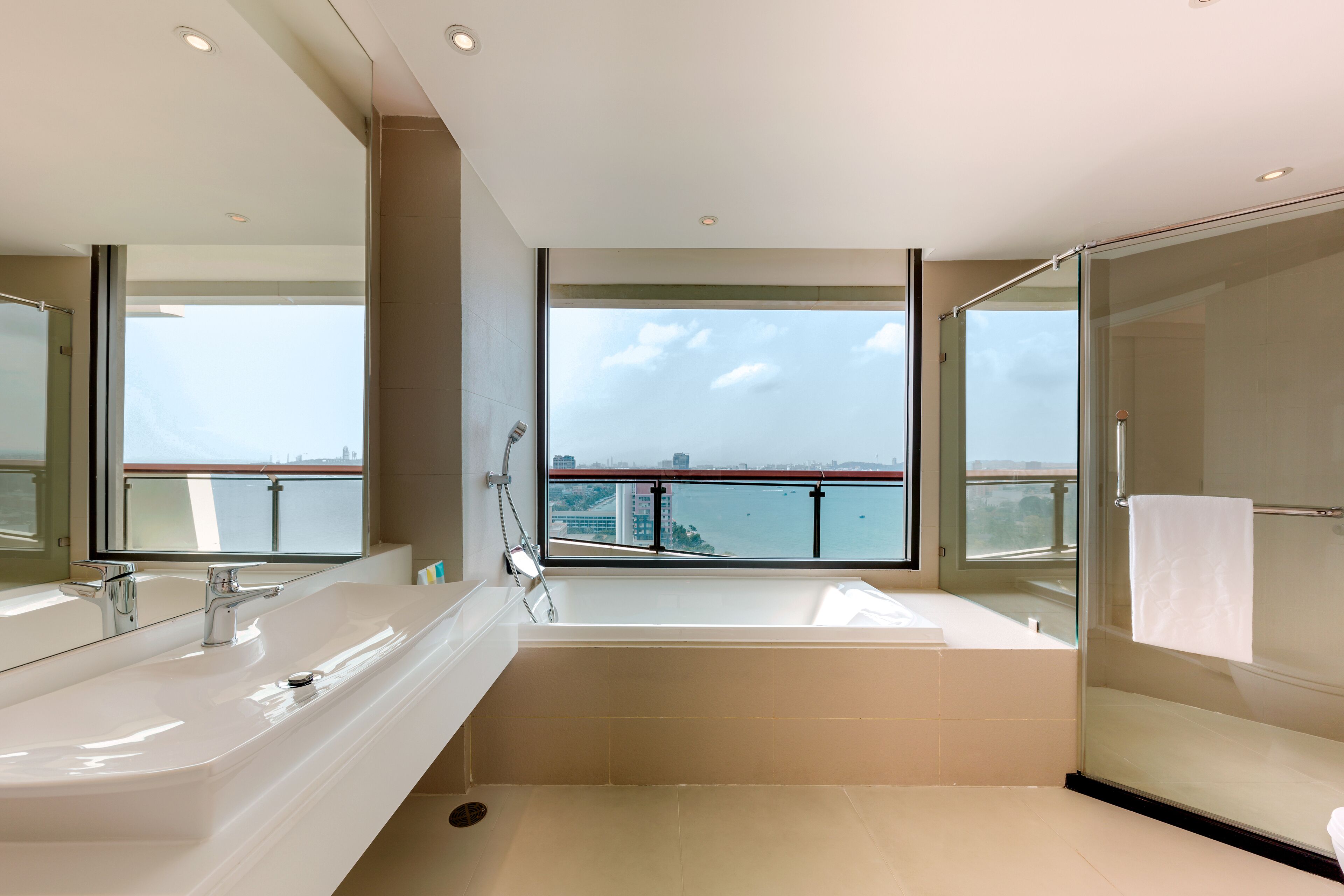 separate bathtub and shower, deep-soaking bathtub, rainfall showerhead