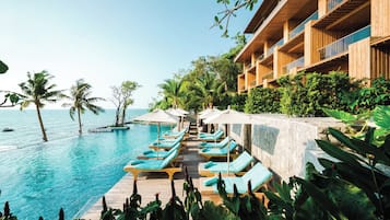 2 outdoor pools, open 7:00 AM to midnight, pool loungers