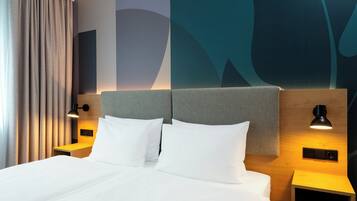 Hypo-allergenic bedding, in-room safe, desk, laptop workspace