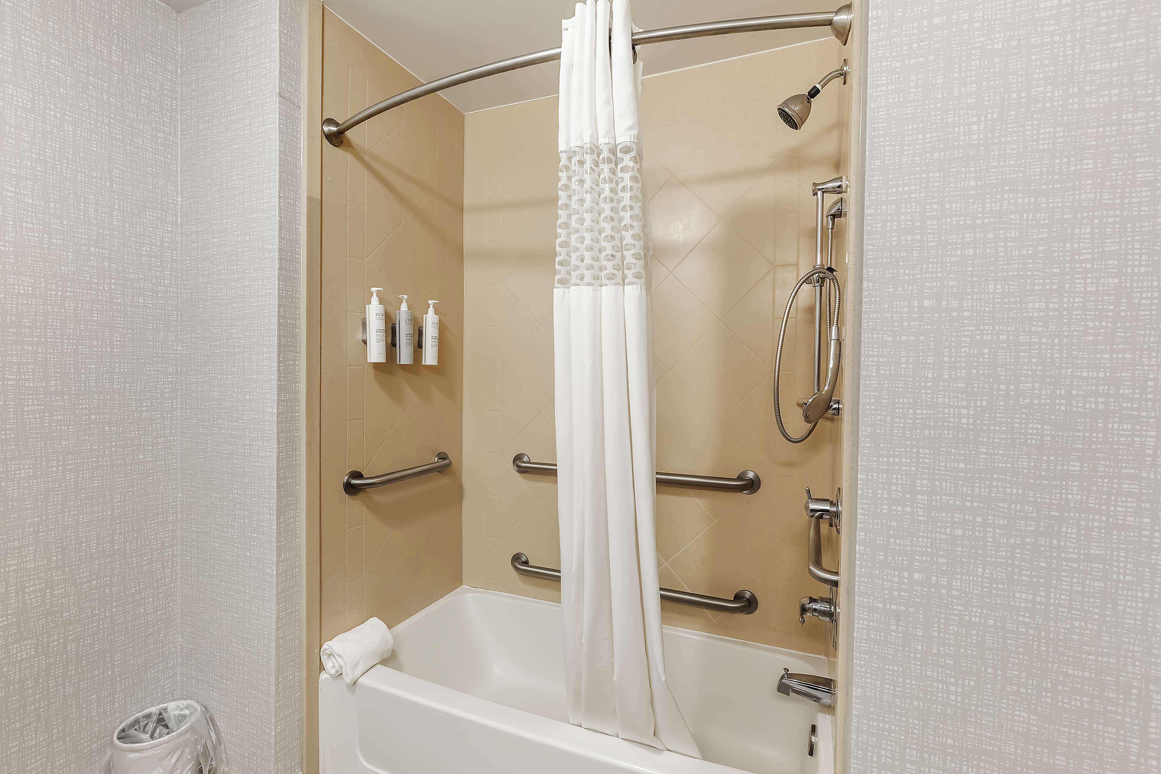 combined shower/bathtub, free toiletries, hair dryer, towels