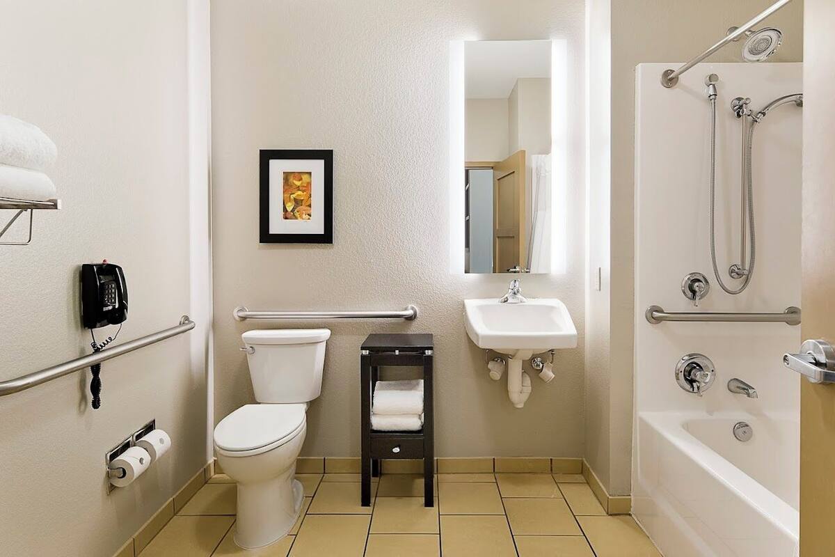 classic room, 2 queen beds, accessible | bathroom | free toiletries, hair dryer, towels